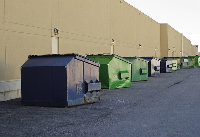 dumpsters lined up waiting to be filled with construction waste in Berlin